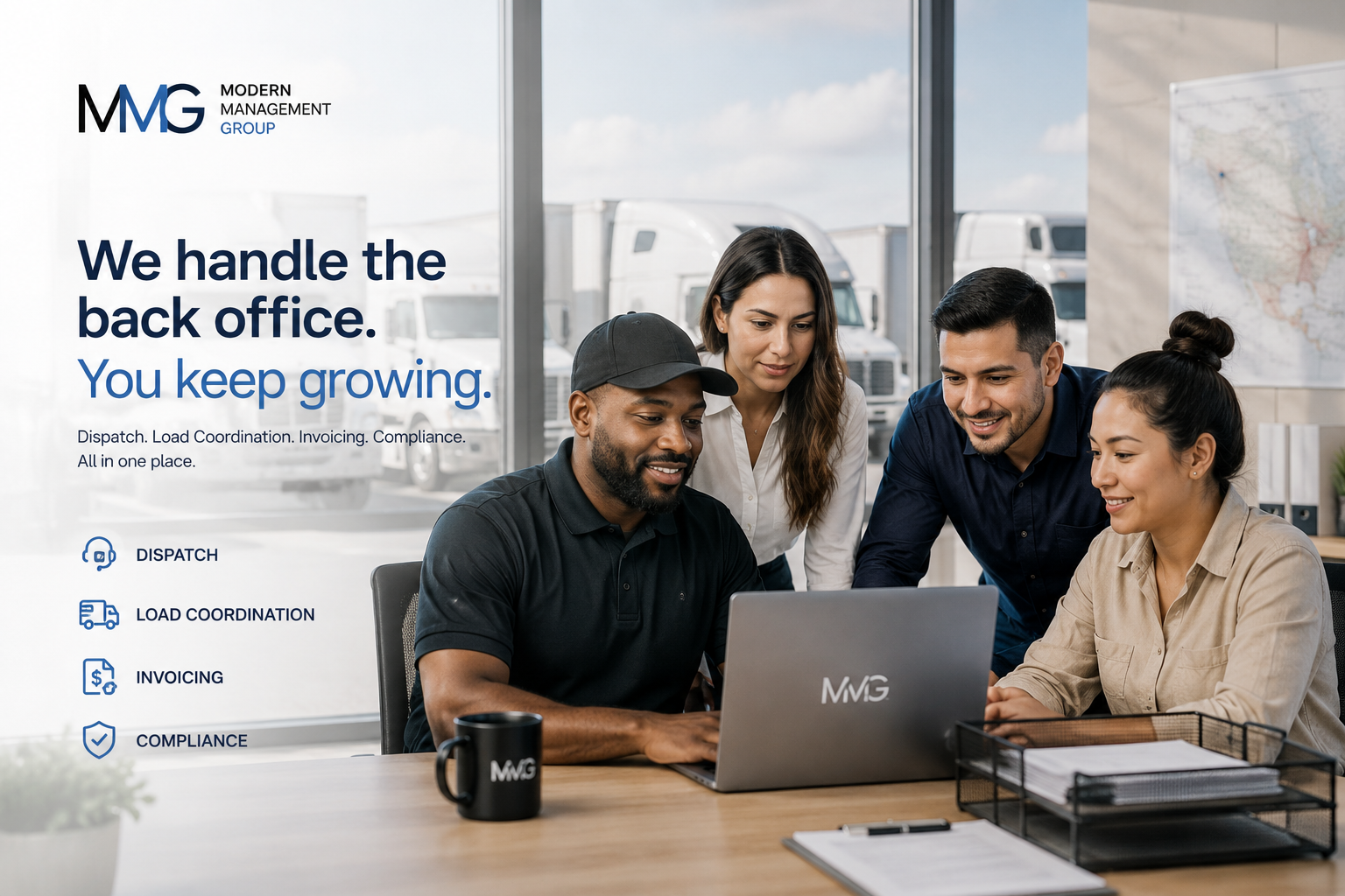 Multicultural MMG team working at desk